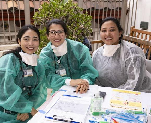 SCOPE volunteers at a table